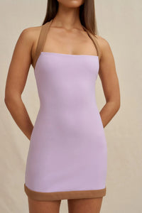 Close-up of the BY JOHNNY Jade Halter Mini Dress showing contrast straps and stretch crepe jersey fabric