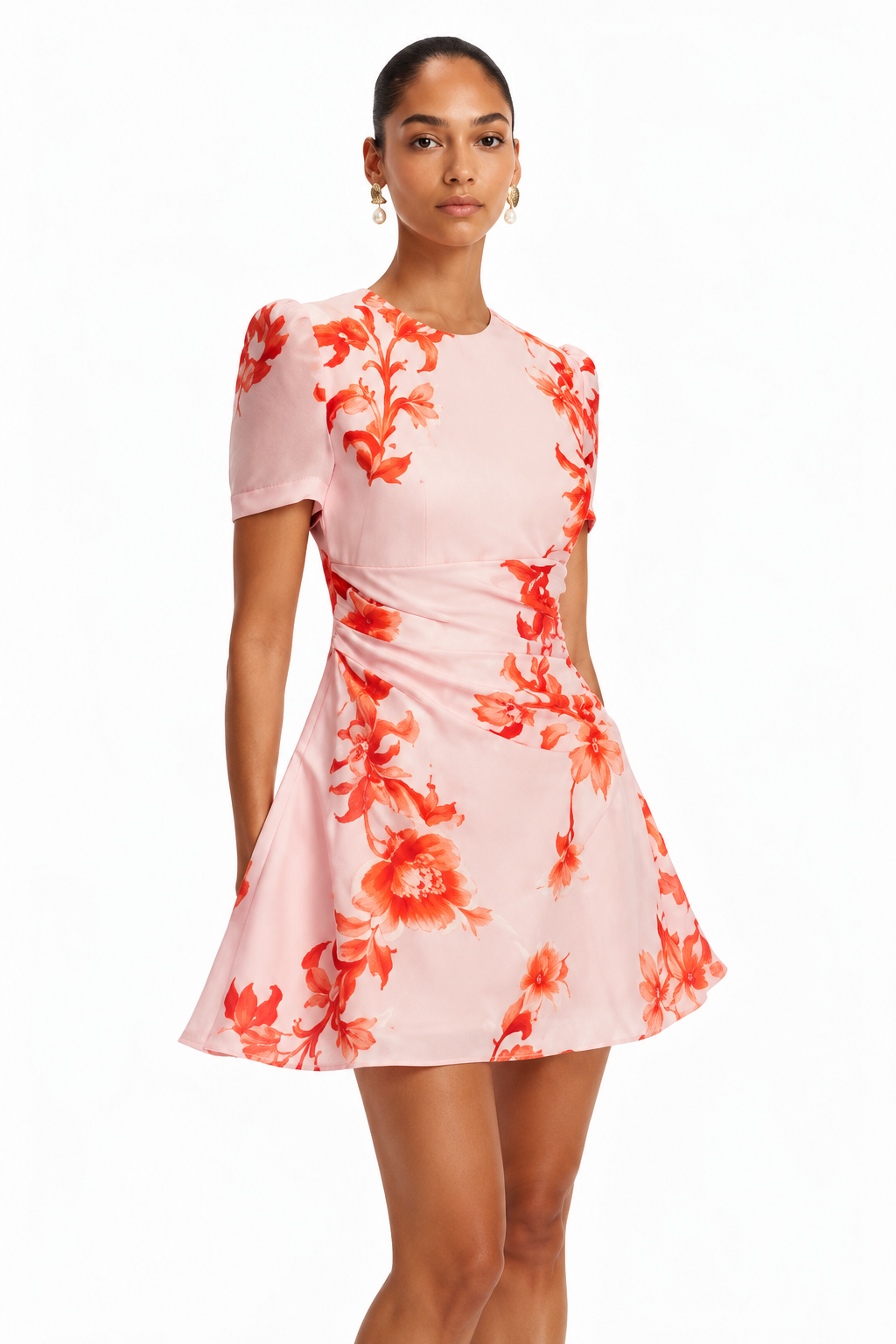 Leo Lin Elyse Short Sleeve Mini Dress in blush pink Magnolia Print featuring coral florals, short sleeves, a fitted bodice and ruched waist. Designer dress hire Melbourne.