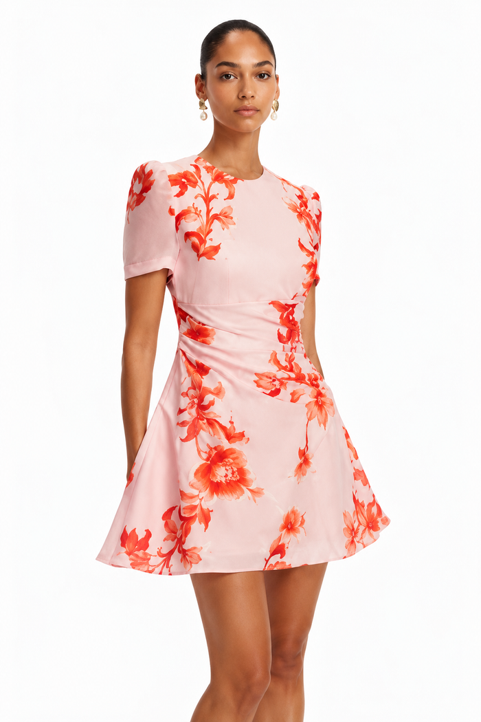 Leo Lin Elyse Short Sleeve Mini Dress in blush pink Magnolia Print featuring coral florals, short sleeves, a fitted bodice and ruched waist. Designer dress hire Melbourne.