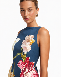 Close-up of intricate 3D hand-sewn floral appliqué embroidery on the Leo Lin Ali Mini Dress.