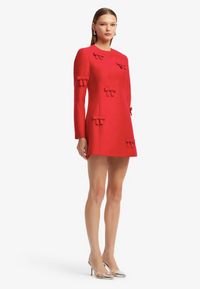 Side profile of the LEO LIN Aliza Bow Long Sleeve Mini Dress showcasing the flattering A-line silhouette available for designer dress hire.