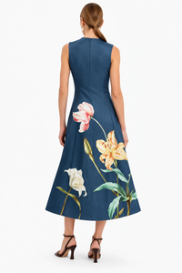 Back view of Leo Lin Cleo Embroidered Sleeveless Midi Dress in dusty navy, featuring a fitted waist, invisible back zip and floral embroidery along the A-line skirt.